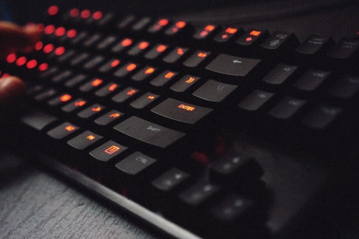 Close-up of a backlit keyboard symbolizing submission of an SOP for graduate school