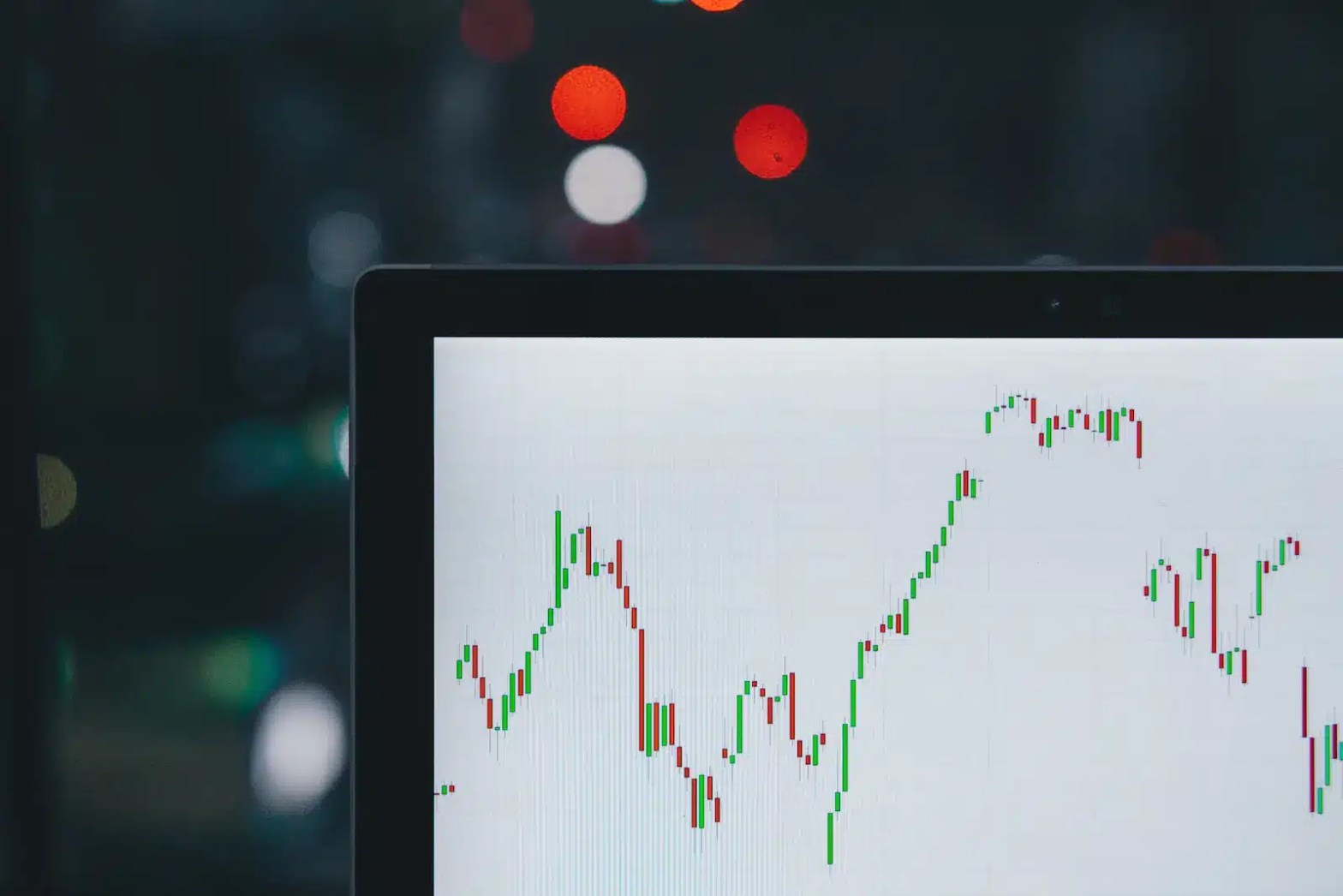 laptop displaying data analytics graphs representing business analytics master's programs