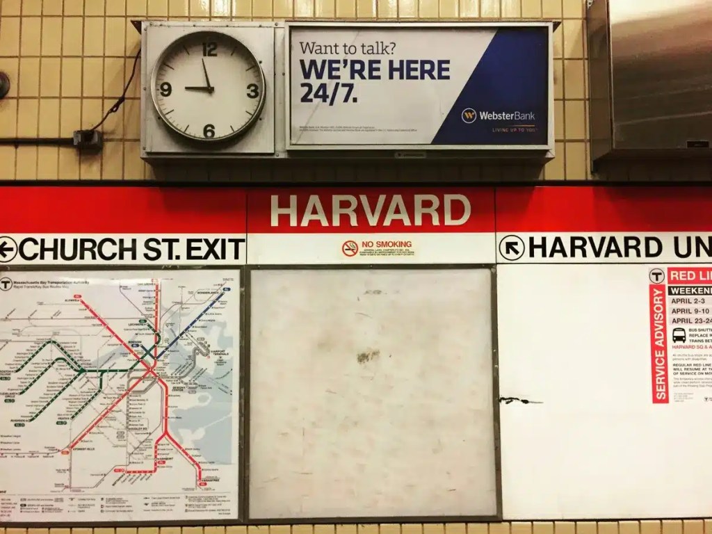Harvard Kennedy School acceptance rate infographic — MBTA Harvard Square sign near campus