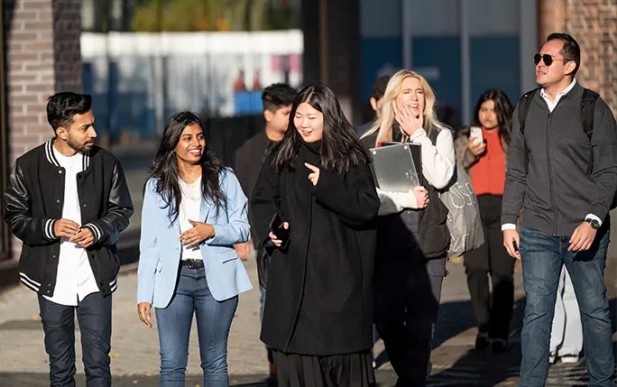 Students collaborating in a top Master’s in Management program 2025