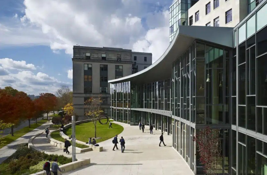 MIT Sloan cover letter blog hero — MIT Sloan School of Management exterior, Cambridge, highlighting MBA cover letter SEO presence