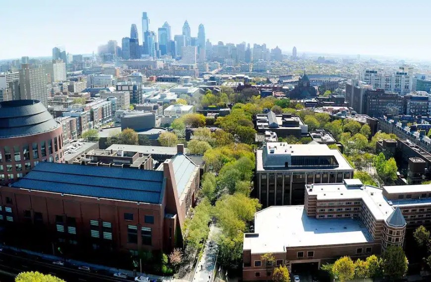 Wharton EMBA acceptance rate banner showing Wharton Executive MBA Philadelphia campus aerial view