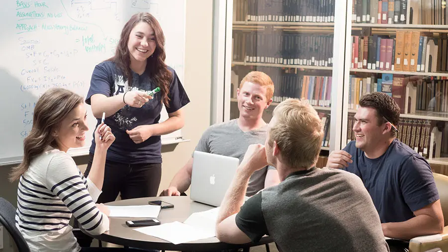 UK PhD vs US PhD comparison showing differences in structure, funding, and admissions