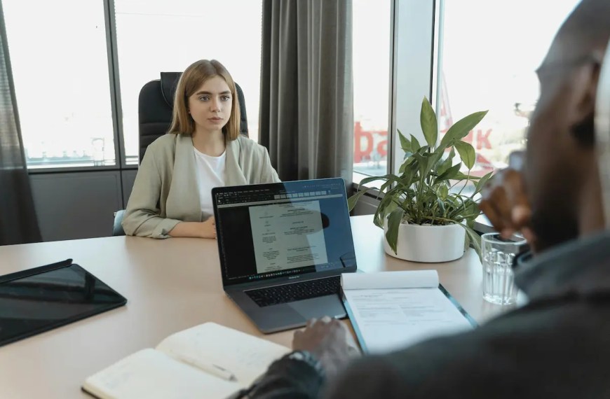 PhD interview questions being discussed during an academic interview as a faculty member evaluates a doctoral applicant’s research thinking and fit
