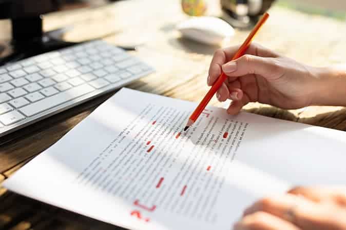 Graduate application materials marked with reviewer annotations